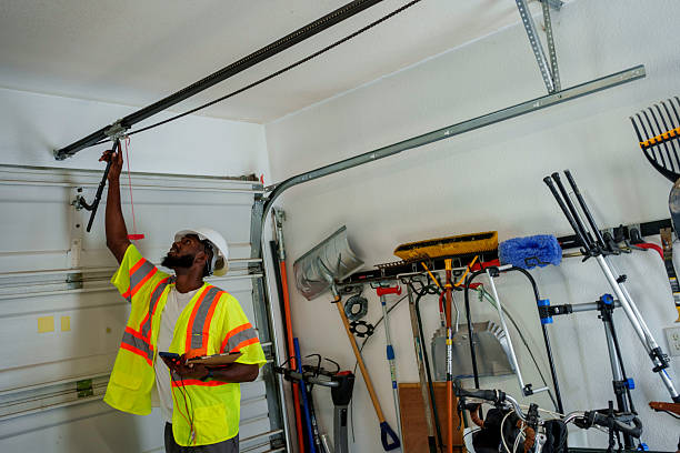 Professional Garage Door technician working in Elsa, TX